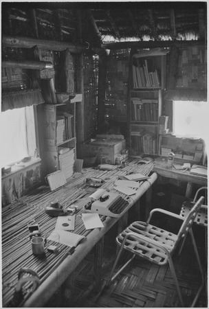 Edwin Cook&#39;s house in Kwiop: desk, typewriter, and books