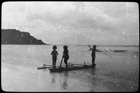People paddling a canoe