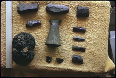 Stone pounders and other artifacts from archaeology dig, Society Islands