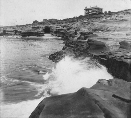 La Jolla shore, consisting of sandstone and accompanying concretions, with residence of Ellen Browning Scripps. 1906