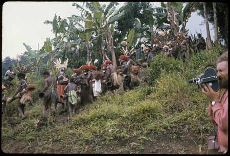 Pig festival, wig ritual:: young men with red wigs (mamp gunc) emerge from seclusion, Marek Jablonko films