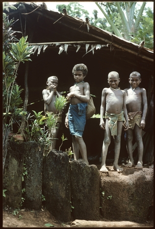 Children in front of house, probably a men&#39;s house.