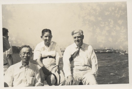 Claude M. Adams (right) on a visit to a Japanese fishing village and fish processing plant. Japan, c1947. Adams worked on ...
