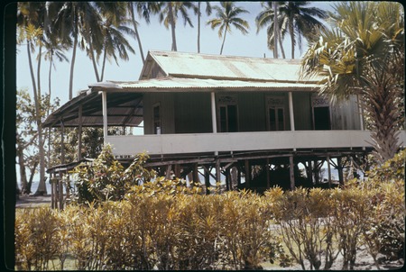 House on raised platform with broad verandah, Papetoai, Moorea