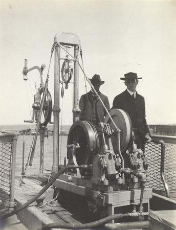 Sigsbee Sounding Machine on deck of U.S. Fisheries steamer Albatross, with two men, possibly oceanographers Charles Atwood...