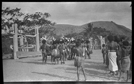 Motu men in circle, drumming and dancing near a dubu platform at Gaile, also spelled Gaire, a village in Central Province
