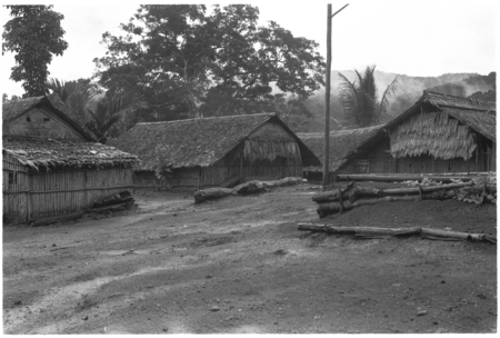Houses in what appears to be a coastal Christian village, likely not in Kwaio.