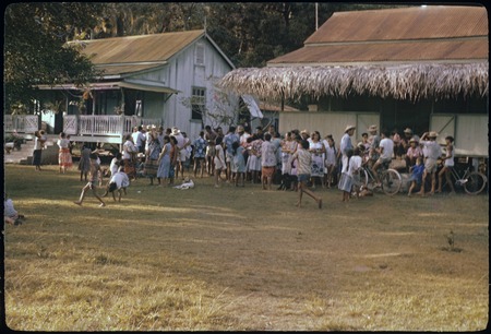 Papetoai villagers wait to see archaeology exhibit, Moorea