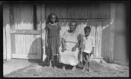 Older Cook Island woman with two children