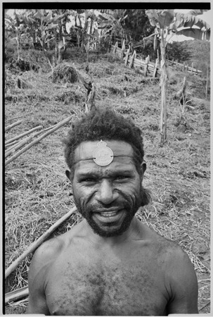 Man wears luluai badge on forehead