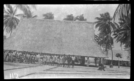 Group of people in front of a meeting house