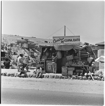 Fruit and soft drink vendors in one of the irregular settlements