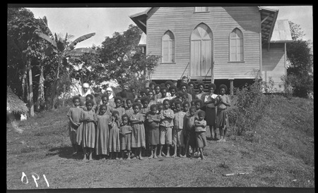Children and missionaries in front of church at Dilava mission