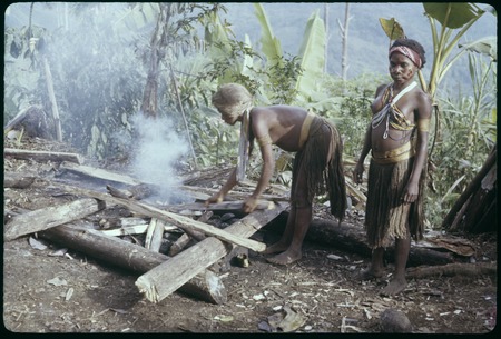 Food preparation: Ngatuomp and Mongor, Maring women, build a fire for cooking, Nemengemp