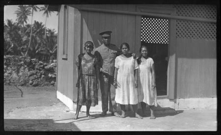 Cook Islands people, one with a police uniform
