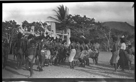 Motu people drumming and dancing near a dubu platform at Gaile, also spelled Gaire, a village in Central Province
