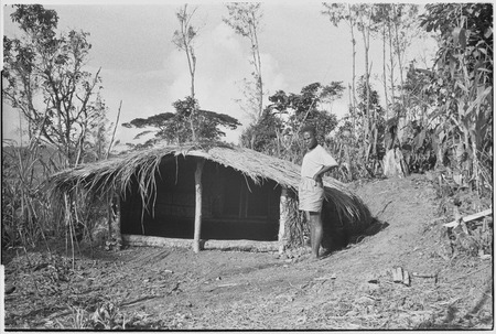 Woman&#39;s house, sleeping quarters (rear), pig stall (center), fireplace and cooking area at entrance