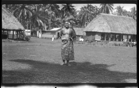 Portrait of man wearing traditional Samoan skirt