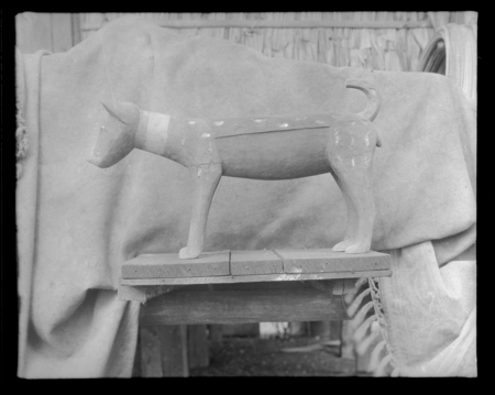 Carving of a wooden canine