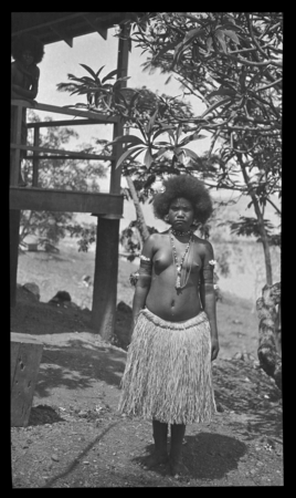 Young Motu woman wearing jewelry