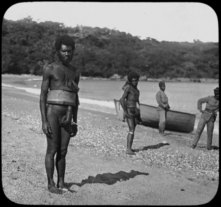 Men on the shore at Malua Bay, Malekula