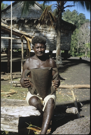 Man holding pottery