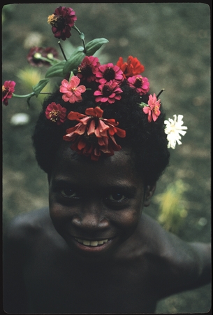 Girl with flowers in hair.