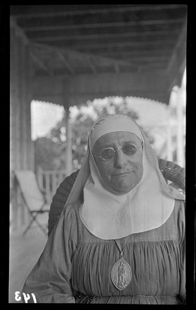 Sister Madeleine of Yule Island Catholic mission, wearing saint pendant