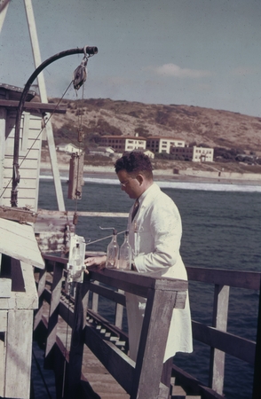Claude E. ZoBell, marine microbiologist, on the Scripps Institution of Oceanography pier