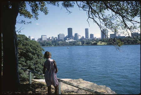 Anne Scheffler looking at the city from across the river
