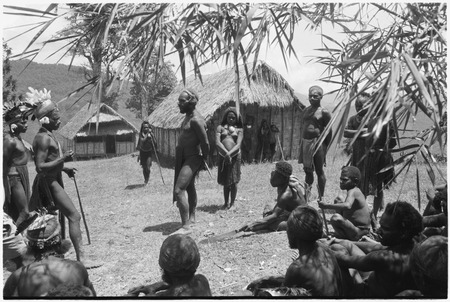 Dispute in Tuguma: disagreement between Mbi (right) over Krp&#39;s (left) shooting of pig