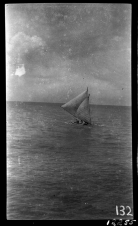 Kiribati canoe with sail