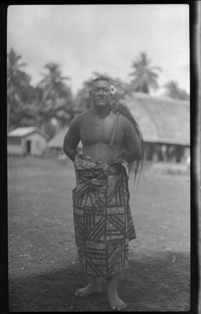 Portrait of man wearing traditional Samoan skirt