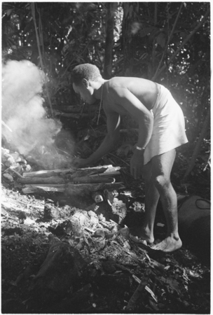 Smothering the pig for sacrifice, Kwailale&#39;e.