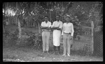 Malakai Veisamasama in center, with two unidentified men
