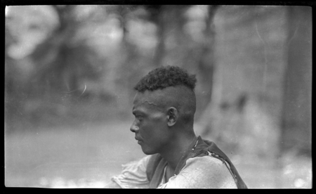 Profile of a man with sides of head shaved