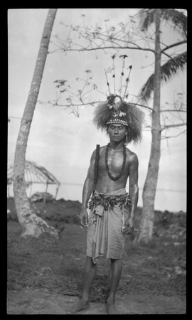 Portrait of young man with traditional Samoan clothing and headdress