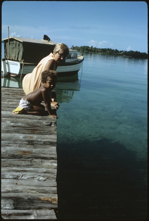 Anne Scheffler and child on a pier