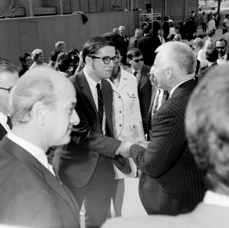 Chancellor William McGill (back towards camera) shaking hands with an unidentified man, dedication of the Basic Science Bu...