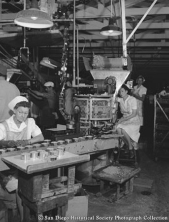 Women packing cans of tuna at Sun Harbor Packing Corporation