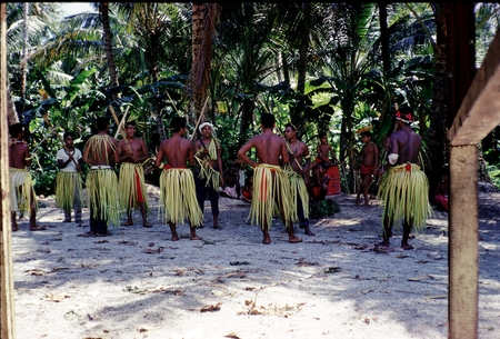 Native men in traditional clothing on Namonuito Atoll, Micronesia