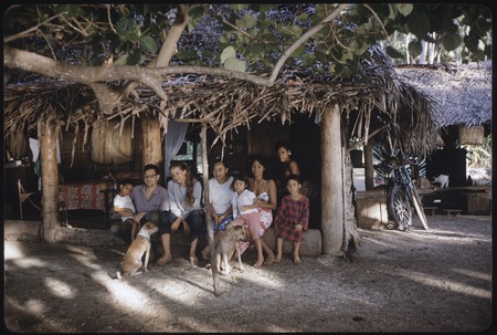Ann and Roy Rappaport with Poia&#39;s family in an open-sided house, Moorea