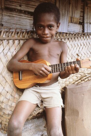 Boy with Uke | Library Digital Collections | UC San Diego Library