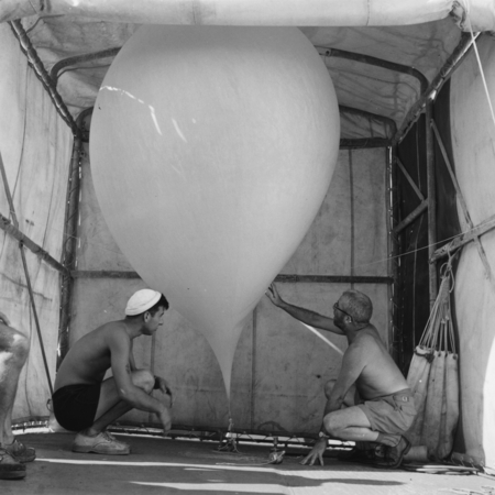 Norman J. Holter (right) and Frank J. Friel with weather balloon on board R/V Horizon