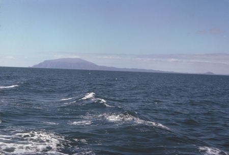 During the Swan Song Expedition (1961) R/V Argo passes near &quot;Fernandina Island&quot;, also known as Narborough Island, in the G...