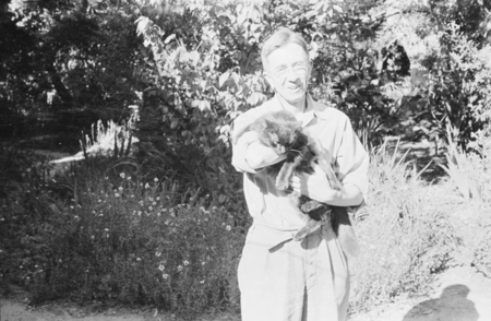 S. Stillman Berry with cat Jitty.
