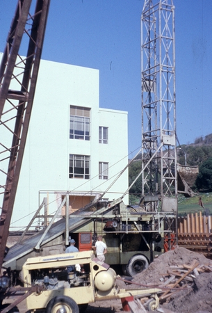 Construction workers using pile drivers during the addition of Ritter Hall on the campus of Scripps Institution of Oceanog...