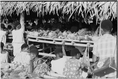 Madang market: produce for sale, arranged on tables