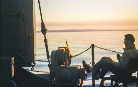Oceanographer at sea enjoying the sunset