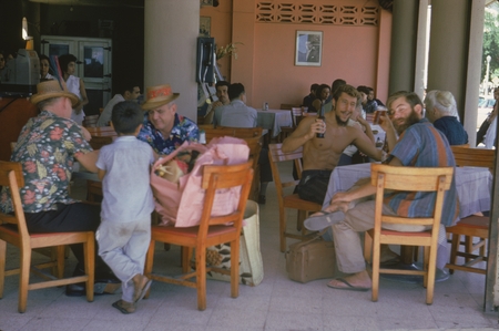 During a break from the Swan Song Expedition (1961) a member of the crew took this photo of other crew members enjoying a ...